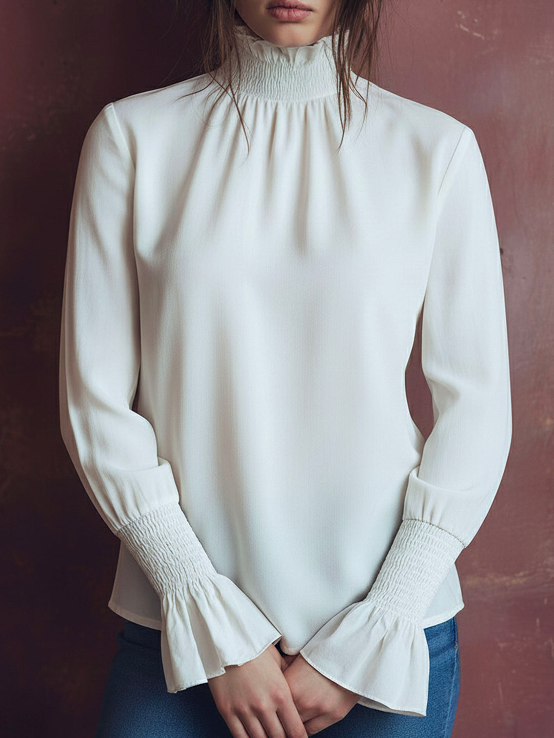 Elegant High Neck White Blouse With Smocked Cuffs And Ruffle Details