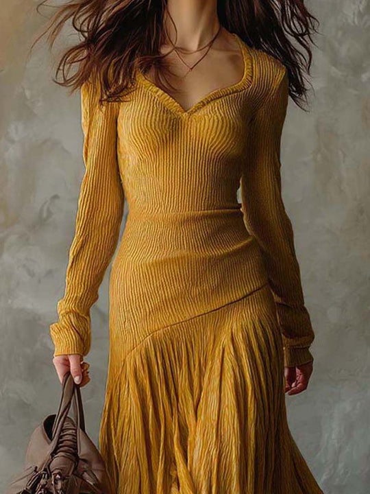 Ribbed Knit Dress With Pleated Flowing Skirt