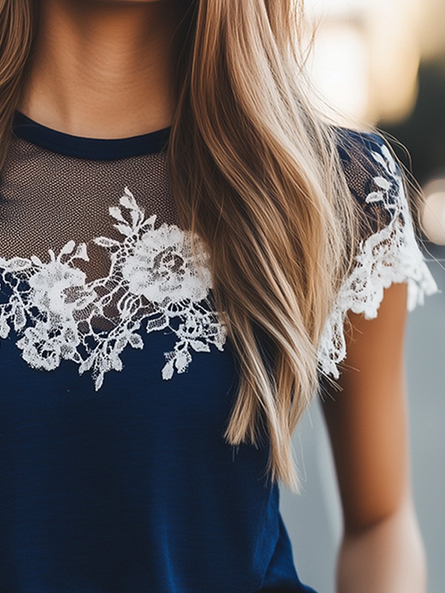 Elegant Navy Top with Sheer Lace Details