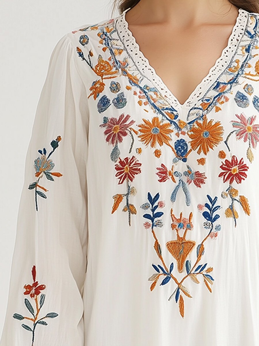 Elegant Floral Embroidered Tunic Blouse with Lace Accents