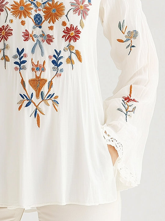 Elegant Floral Embroidered Tunic Blouse with Lace Accents