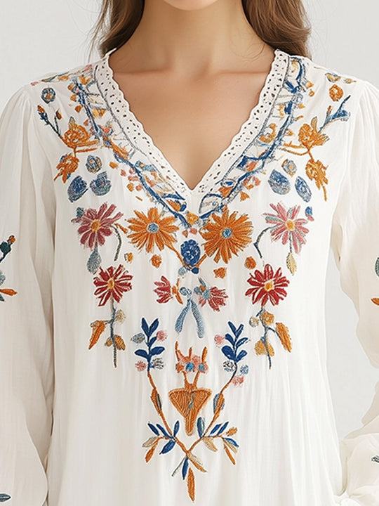 Elegant Floral Embroidered Tunic Blouse with Lace Accents