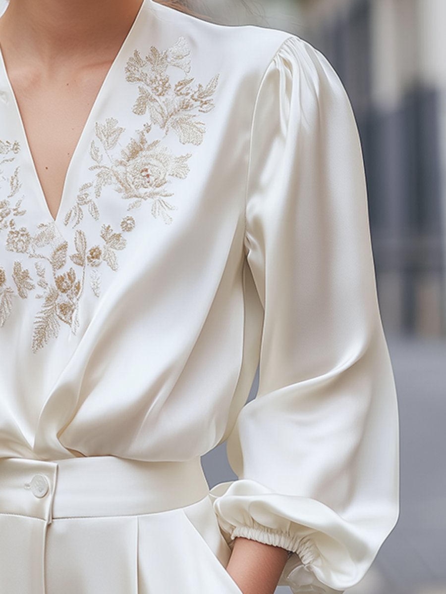 Elegance Redefined: Ivory Embroidered Satin Blouse