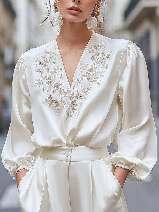 Elegance Redefined: Ivory Embroidered Satin Blouse